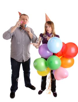 Happy Couple with baloons and bubbles isolated on the white