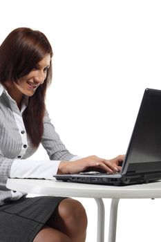 Happy women sitting with computer isolated on the white background