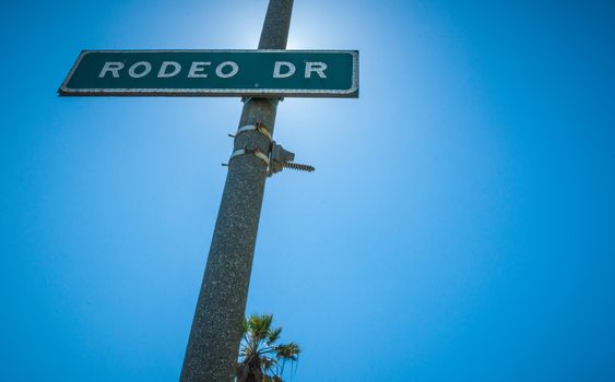 Rodeo Drive Strret sign in Beverly Hills sunlight 2013