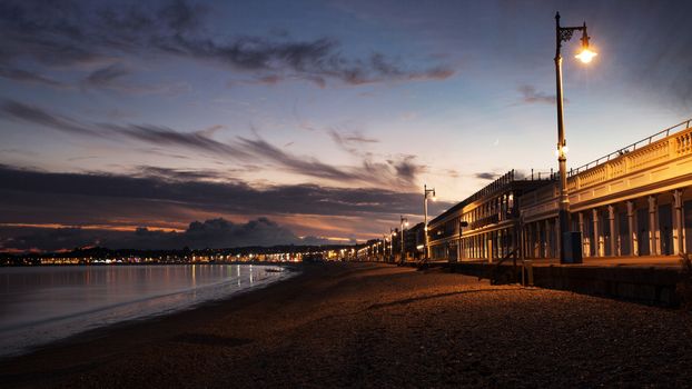 Traditional Seaside Victorian Beach Huts & Cafe Along the Sea Front