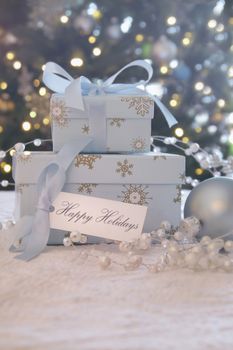 Gift boxes with card with festive background