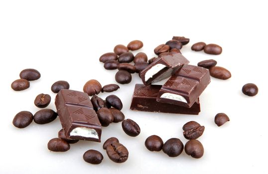 Chocolate And Coffee Isolated On White