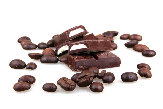 Chocolate And Coffee Isolated On White