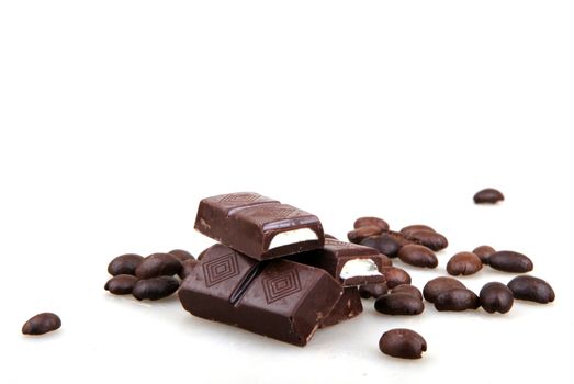 Chocolate And Coffee Isolated On White