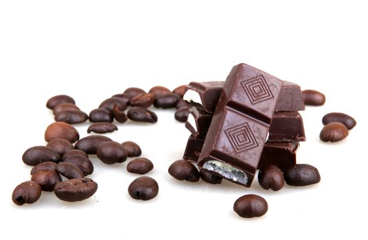 Chocolate And Coffee Isolated On White