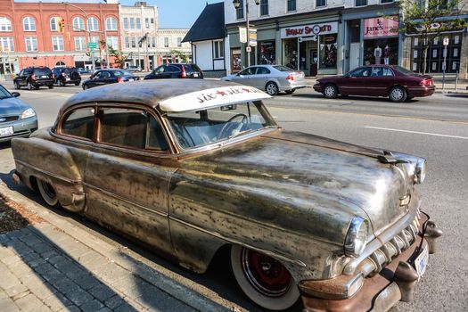 TORONTO, ONTARIO - SEPTEMBER 6: Antique car on the side of a street, in Toronto, ON, Canada, on September 6, 2013. 