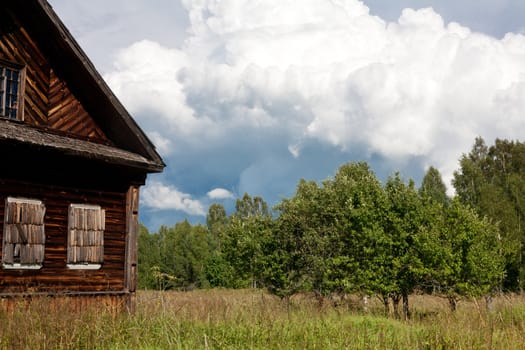 Old wooden house in neglected village
