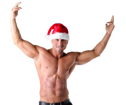 Christmas season: muscular bodybuilder shirtless wearing Santa Claus red hat, isolated on white