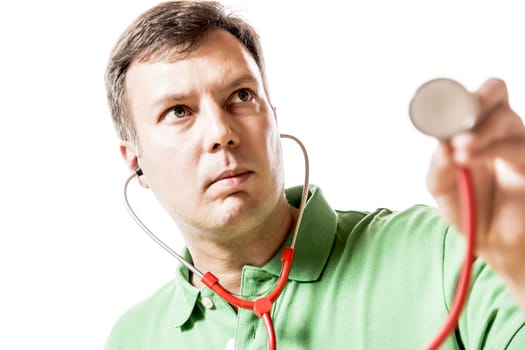 Picture of a doctor with serious face holding a stethoscope