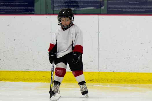 Child playing ice hockey