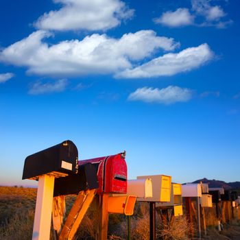 Grunge mail boxes in a row at Arizona desert USA