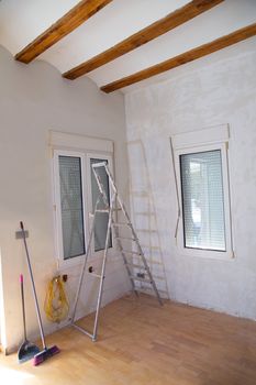 House indoor improvements plater tools and ladder in real situation