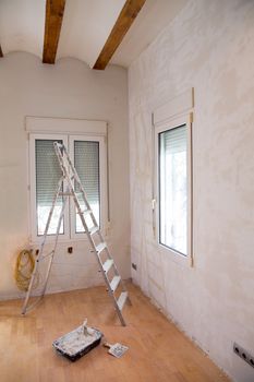 House indoor improvements plater tools and ladder in real situation