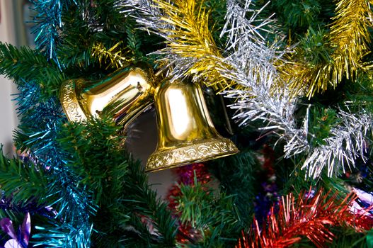 golden bell and Christmas tree