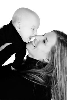 Baby boy and his mom against white background