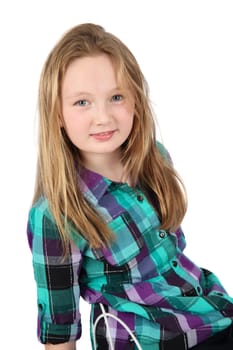 Young teenage girl sitting against white background