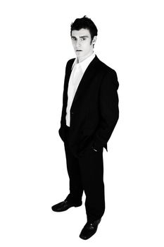 Attractive brunette male in suit with white shirt 