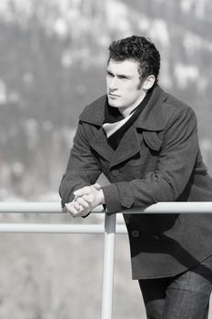 Attractive brunette male outside on a cold winters day