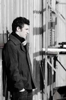 Attractive brunette male outside on a cold winters day