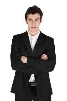 Attractive brunette male model wearing a suit against white