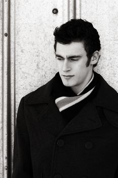 Attractive brunette male outside on a cold winters day