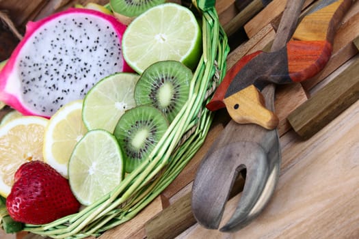 Fruit basket with utencils and variety of fruits