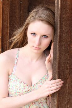 Beautiful blond model outdoors in rural setting natural light