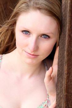 Beautiful blond model outdoors in rural setting natural light