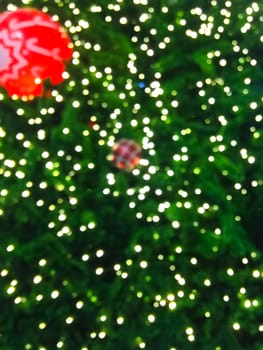bokeh blurred out of focus background Christmas fir tree