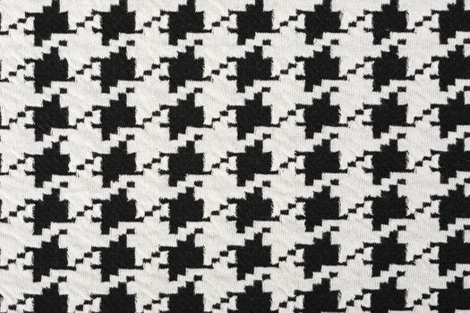 Material in geometric patterns, a textile background.
