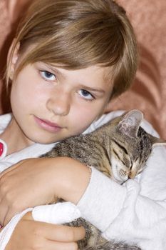 child with kitten