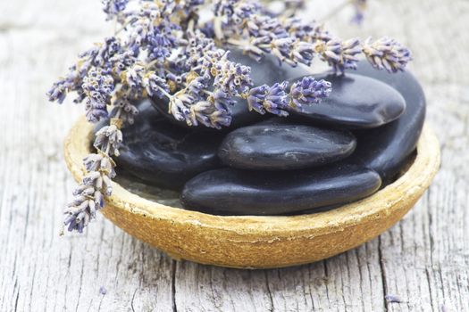 massage stones and dried lavender