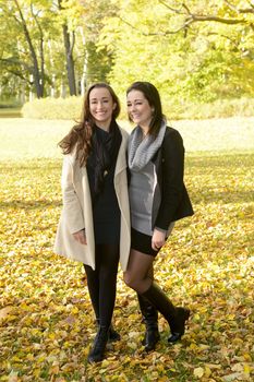 sisters in autumn park