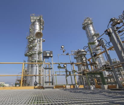 Oil and chemical refinery plant withh blue sky