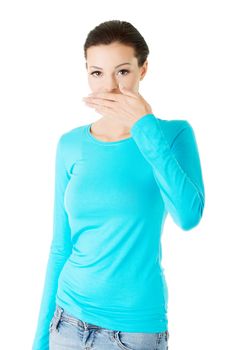 beautiful casual woman covering her mouth. Isolated on white.