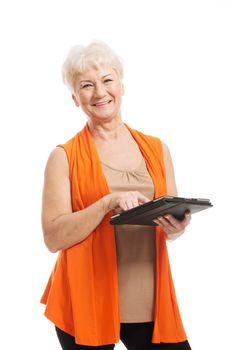 An old lady with tablet. Isolated on white.