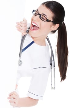 Young doctor, nurse is holding copy space. Isolated on white.