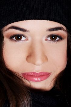 Beautiful woman wearing black hat.