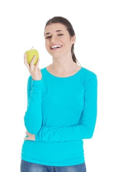 Beautiful casual woman holding an apple. Isolated on white.