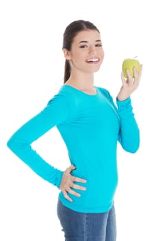 Beautiful casual woman holding an apple. Isolated on white.