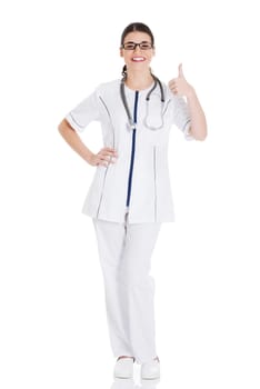 Young beautiful doctor, nurse with stethoscope showing ok. Isolated on white.