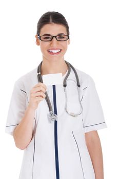 Young female doctor holding business card. Isolated on white.