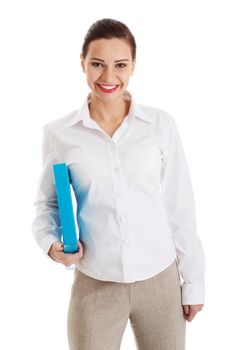 Beautiful young business woman holding file. Isolated on white.