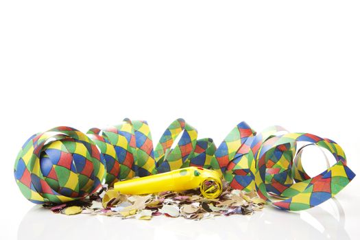 streamers and confetti as decoration for parties, sylvester with white background 