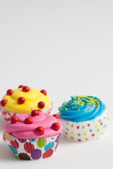 Colorful decorated cupcakes closeup