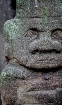 Old  stone idol close to 