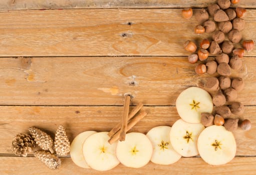 Food background with seasonal ingredients on a wooden surface