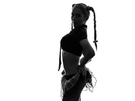 one caucasian sexy woman schoolgirl costume portrait in silhouette studio isolated on white background