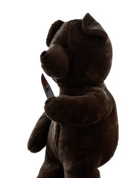 one strange killer teddy bear holding bloody knife in silhouette white background
