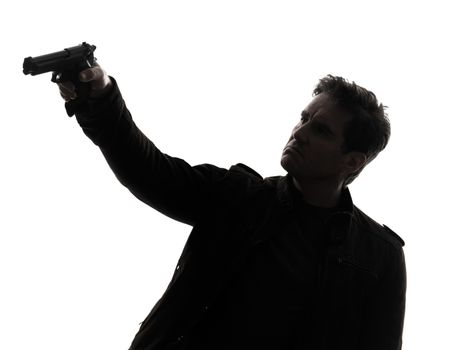 one man killer policeman aiming gun silhouette studio white background